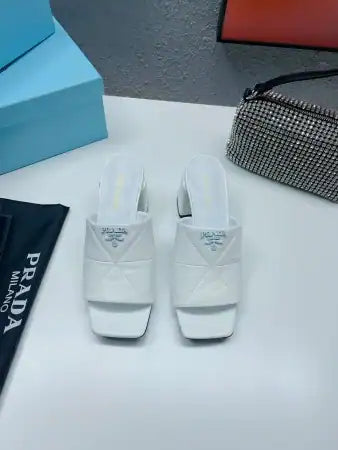 PRADA HEELED SLIDE SANDALS 65MM IN WHITE NAPPA LEATHER – PSD036