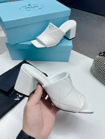 PRADA HEELED SLIDE SANDALS 65MM IN WHITE NAPPA LEATHER – PSD036
