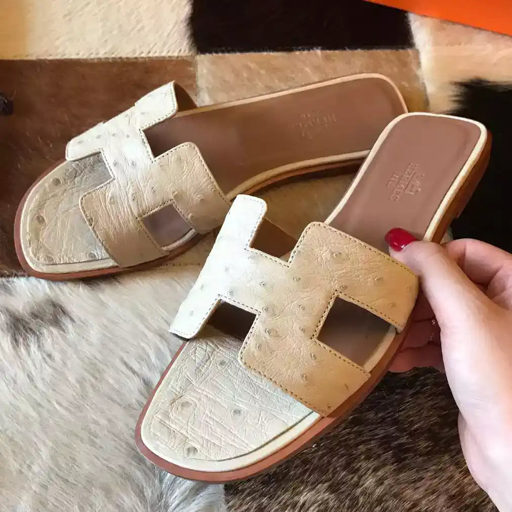 HERMES ORAN SLIDE SANDALS IN BETON OSTRICH LEATHER- HMSD066
