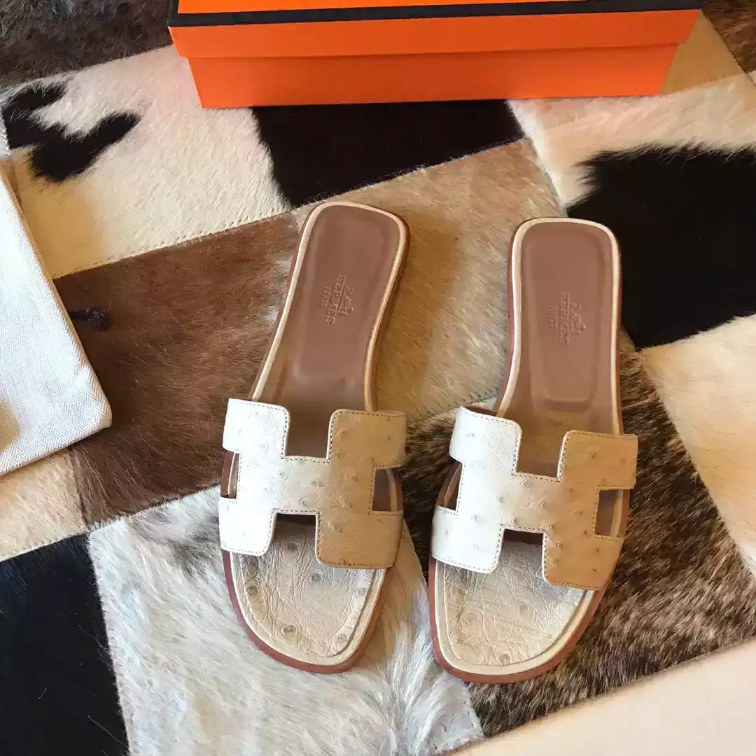HERMES ORAN SLIDE SANDALS IN BETON OSTRICH LEATHER- HMSD066