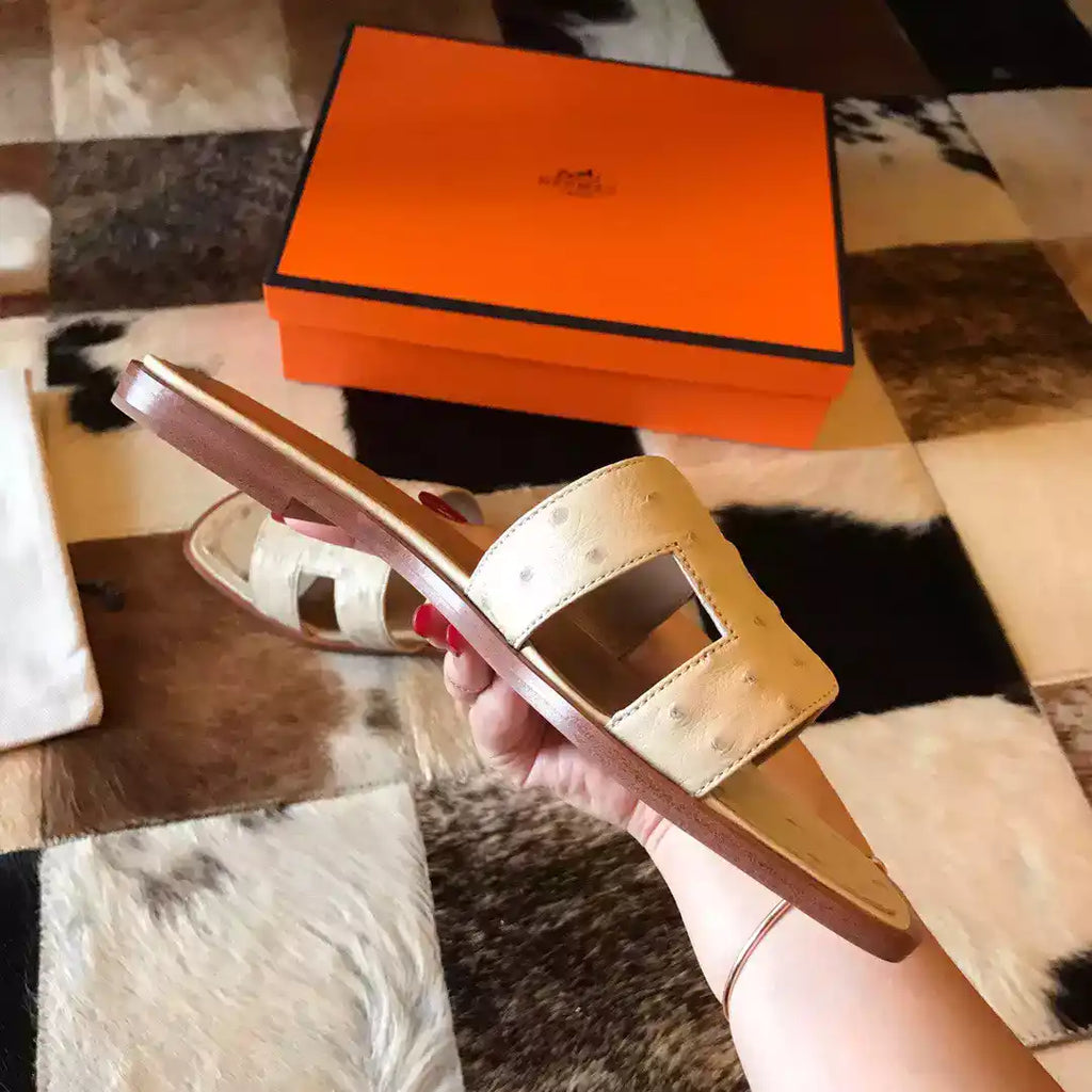 HERMES ORAN SLIDE SANDALS IN BETON OSTRICH LEATHER- HMSD066