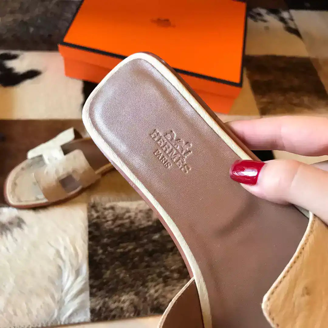 HERMES ORAN SLIDE SANDALS IN BETON OSTRICH LEATHER- HMSD066