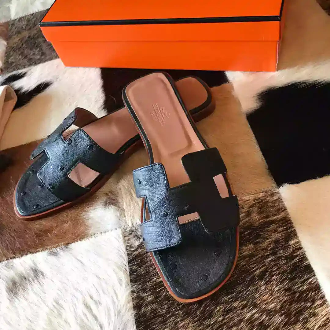HERMES ORAN SLIDE SANDALS IN BLACK OSTRICH LEATHER – HMSD078