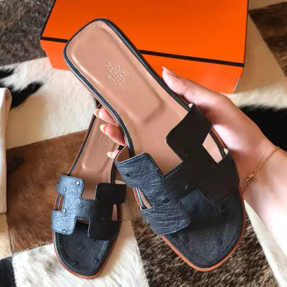 HERMES ORAN SLIDE SANDALS IN BLACK OSTRICH LEATHER – HMSD078