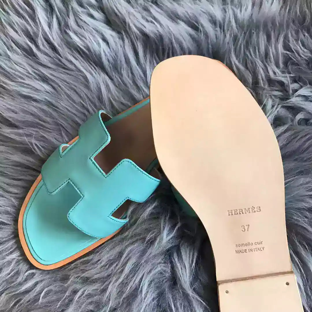 HERMES ORAN SLIDE SANDALS IN BLUE ATOLL SWIFT CALFSKIN – HMSD123