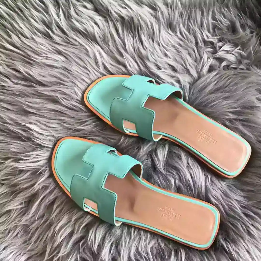 HERMES ORAN SLIDE SANDALS IN BLUE ATOLL SWIFT CALFSKIN – HMSD123