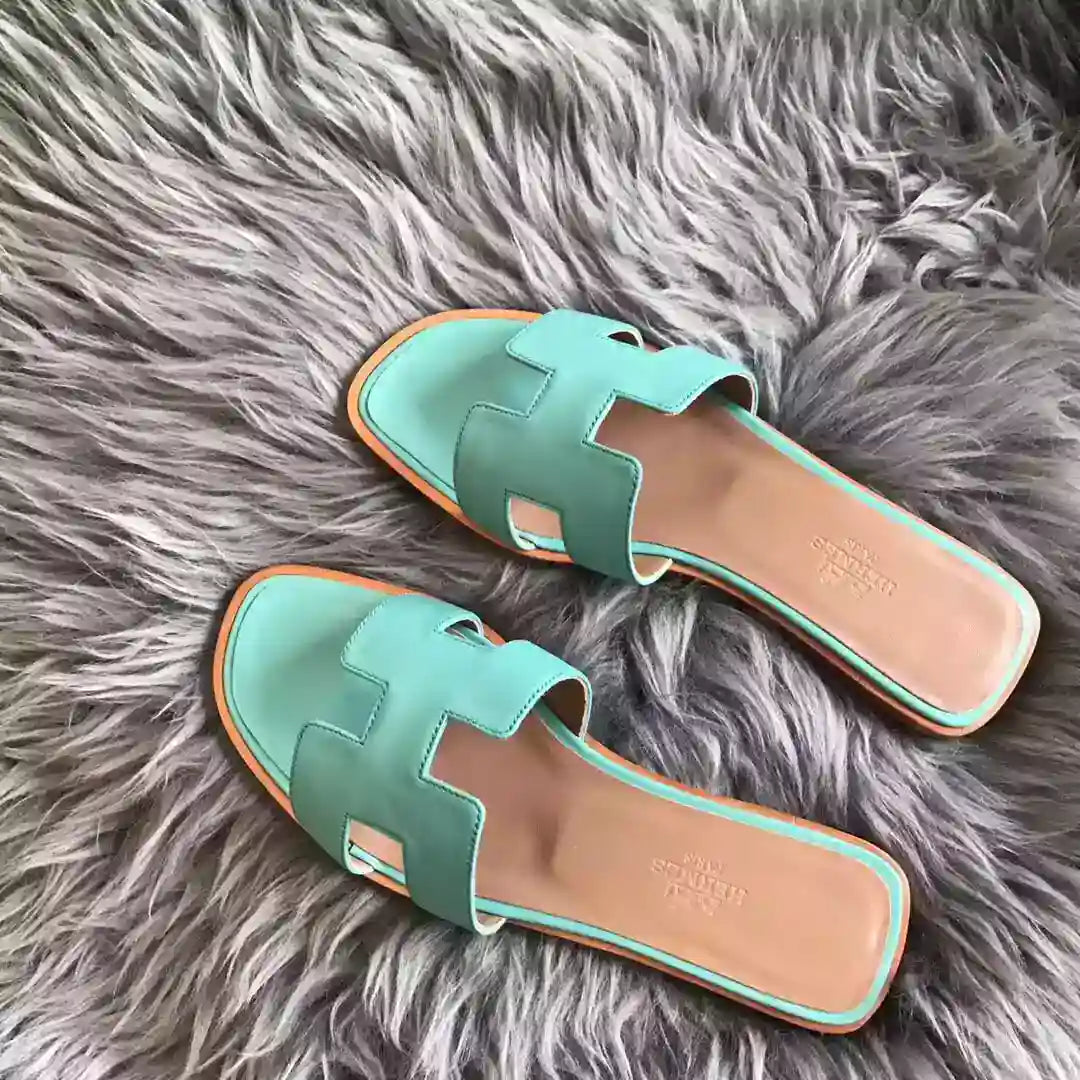 HERMES ORAN SLIDE SANDALS IN BLUE ATOLL SWIFT CALFSKIN – HMSD123