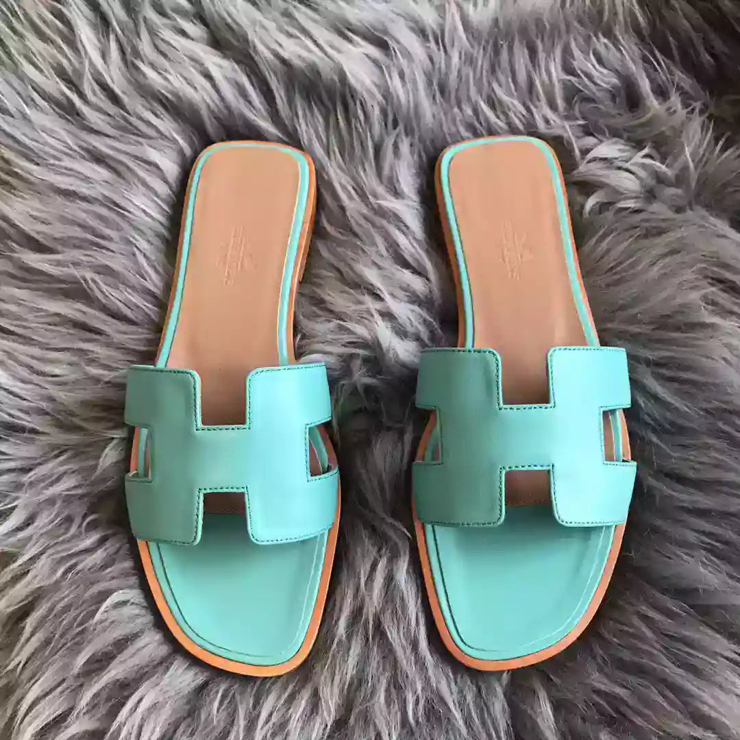 HERMES ORAN SLIDE SANDALS IN BLUE ATOLL SWIFT CALFSKIN – HMSD123