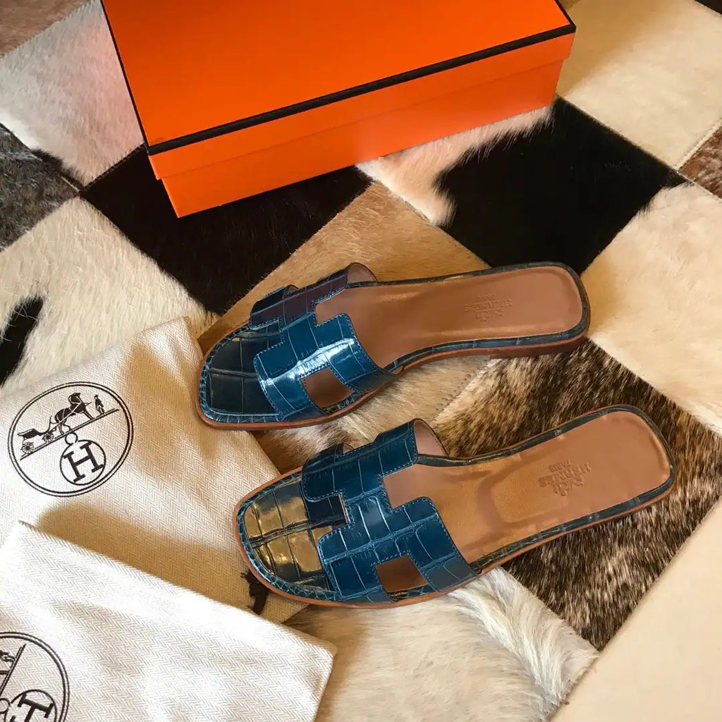 HERMES ORAN SLIDE SANDALS IN BLUE SHINY NILOTICUS CROCODILE SKIN – HMSD050