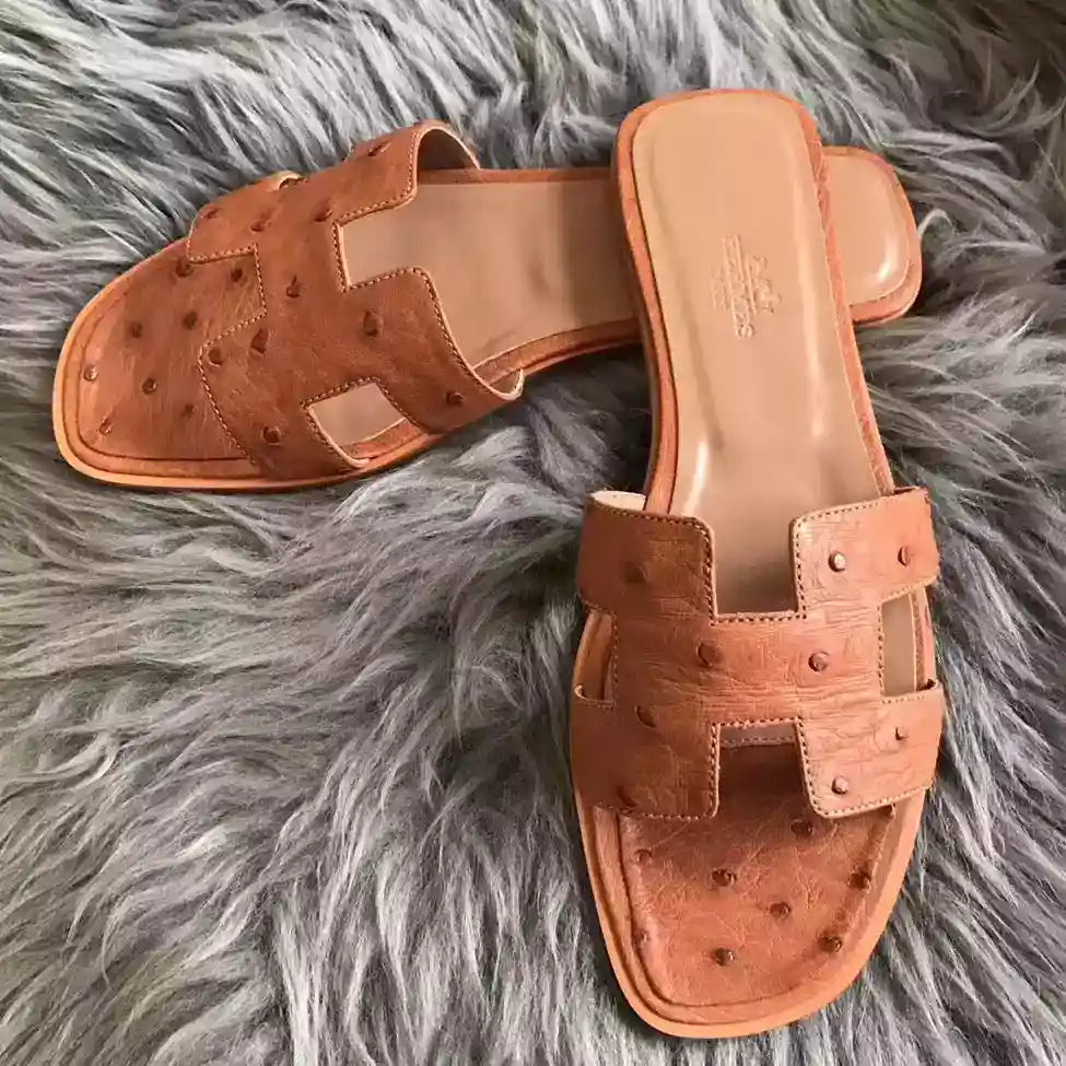 HERMES ORAN SLIDE SANDALS IN BROWN OSTRICH LEATHER – HMSD077