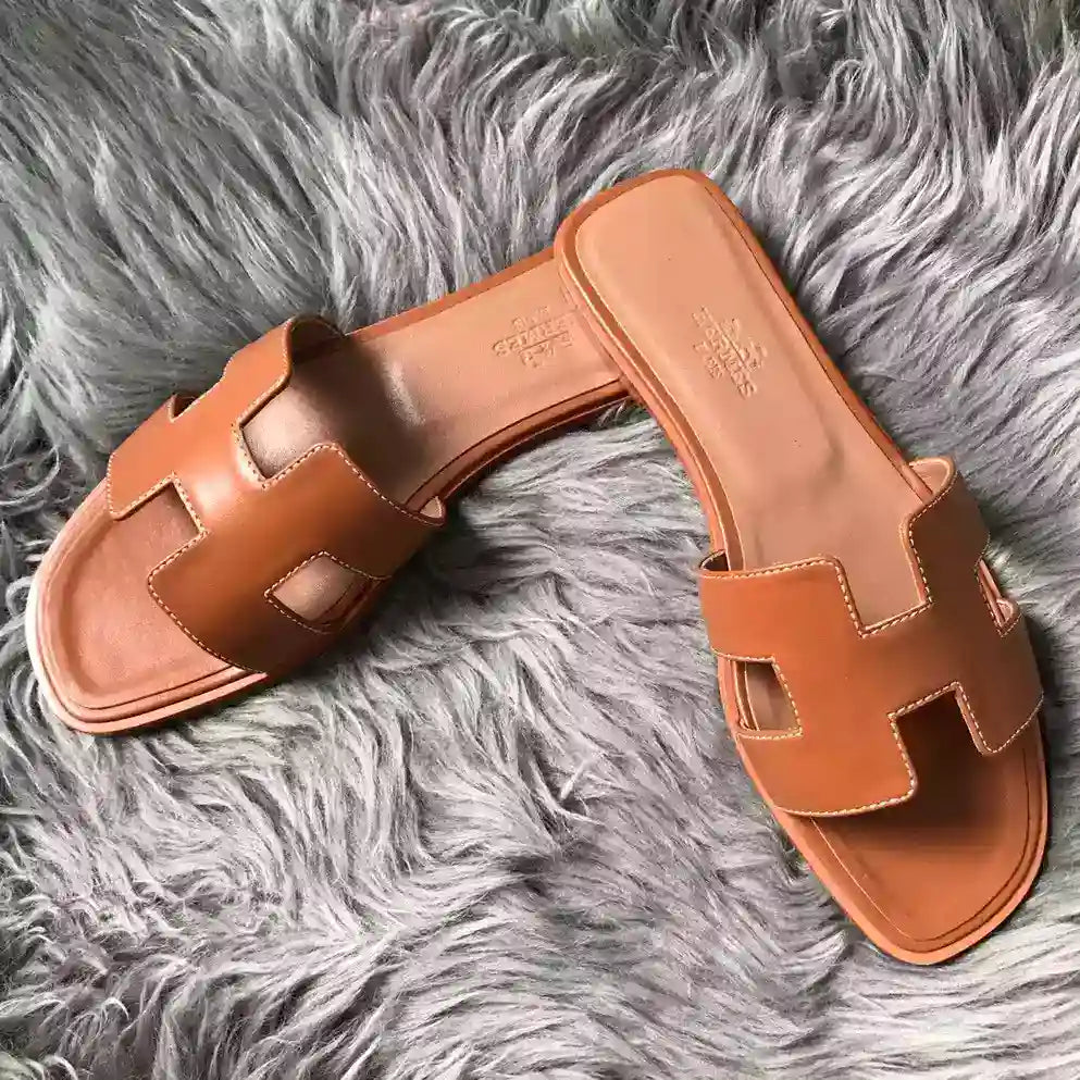 HERMES ORAN SLIDE SANDALS IN BROWN SWIFT CALFSKIN – HMSD129