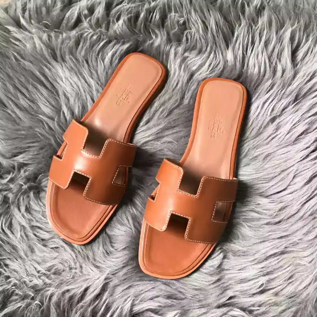 HERMES ORAN SLIDE SANDALS IN BROWN SWIFT CALFSKIN – HMSD129