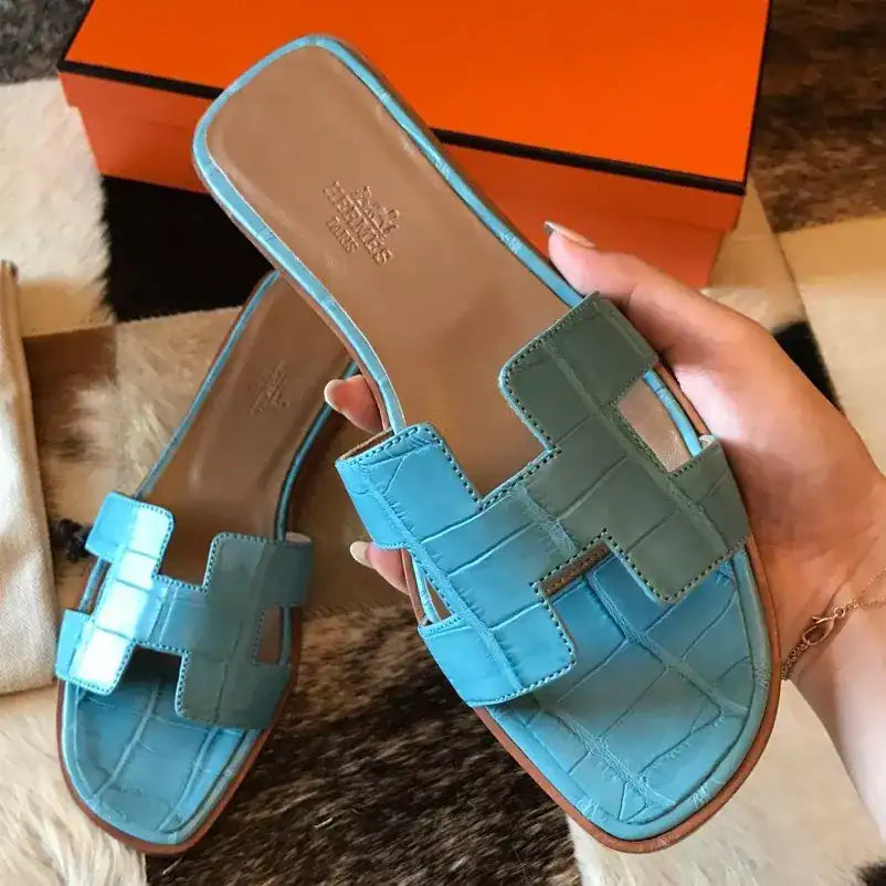 HERMES ORAN SLIDE SANDALS IN CELESTE SHINY NILOTICUS CROCODILE SKIN – HMSD048