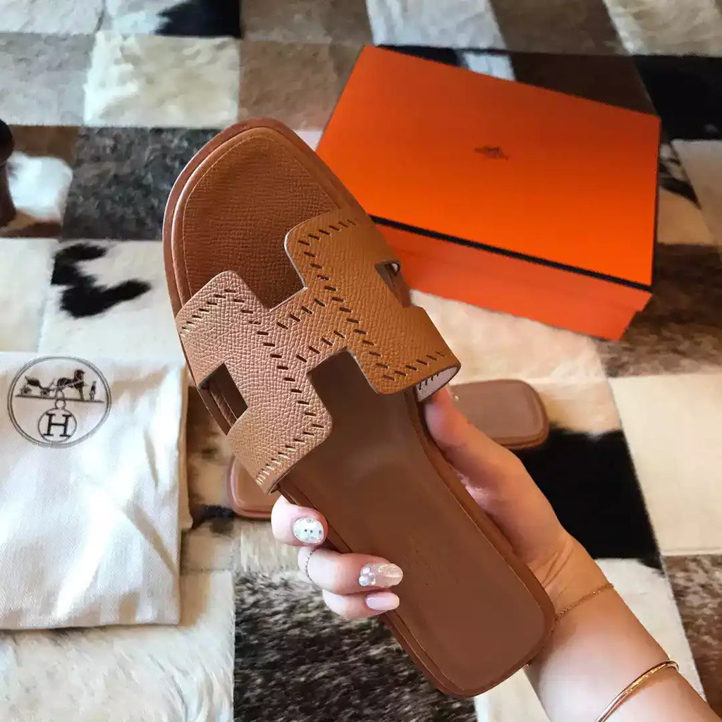 HERMES ORAN SLIDE SANDALS IN GOLD EPSOM PERFORATED CALFSKIN – HMSD096