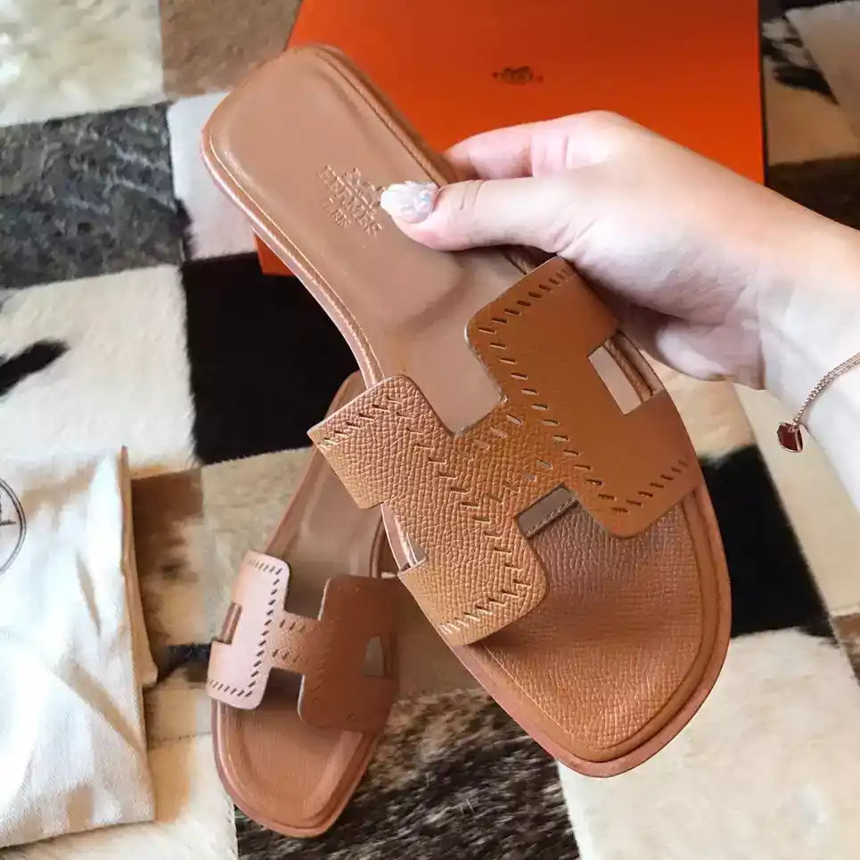 HERMES ORAN SLIDE SANDALS IN GOLD EPSOM PERFORATED CALFSKIN – HMSD096