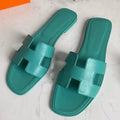 HERMES ORAN SLIDE SANDALS IN LAKE GREEN SWIFT CALFSKIN – HMSD118
