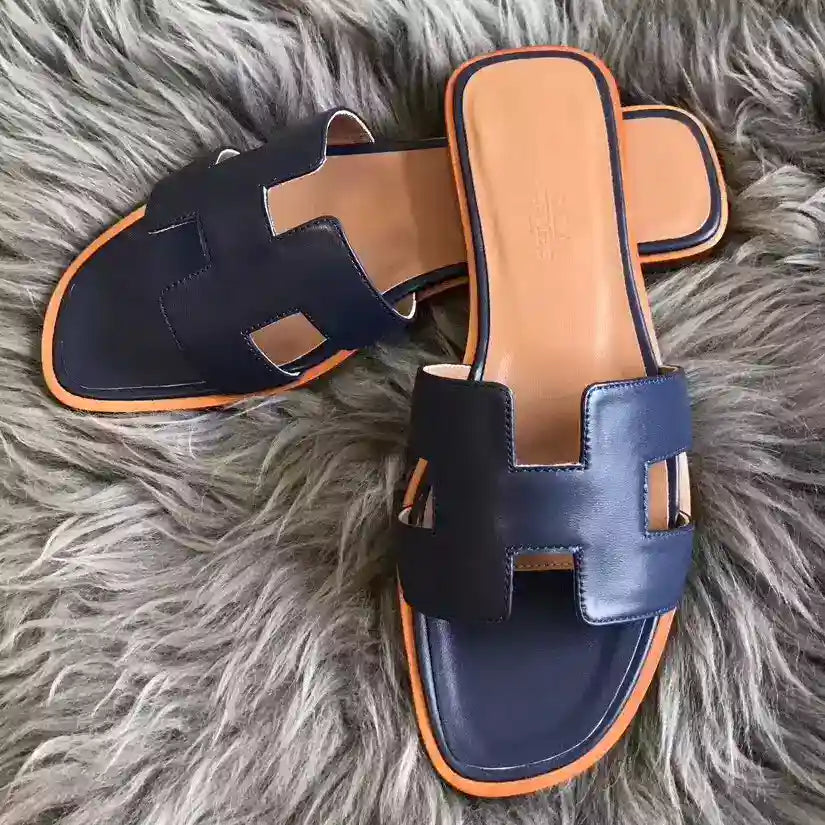 HERMES ORAN SLIDE SANDALS IN NAVY BLUE SWIFT CALFSKIN – HMSD126