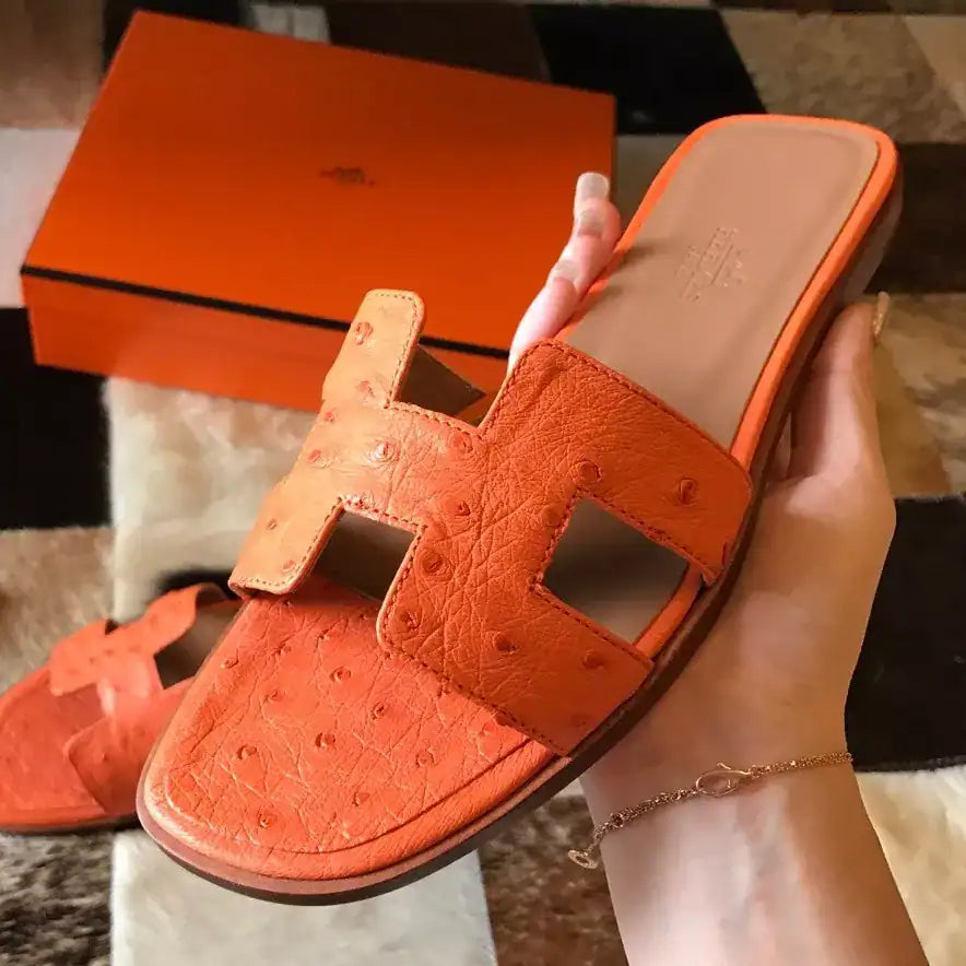 HERMES ORAN SLIDE SANDALS IN ORANGE OSTRICH LEATHER – HMSD067