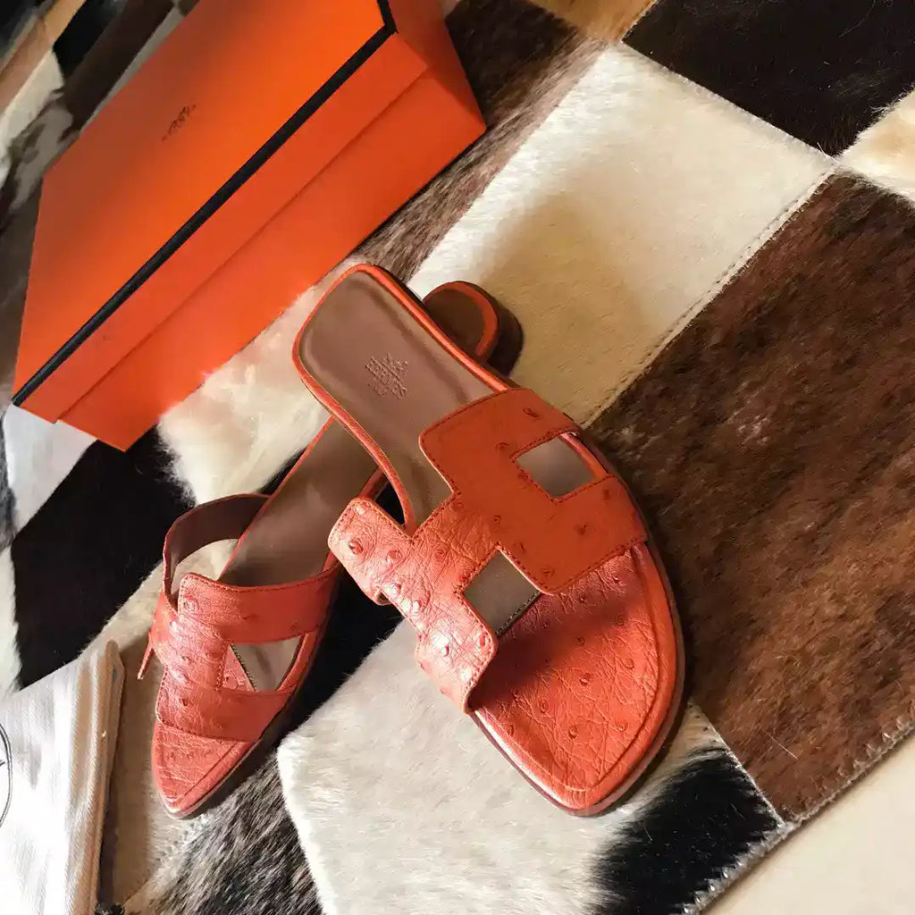 HERMES ORAN SLIDE SANDALS IN ORANGE OSTRICH LEATHER – HMSD067