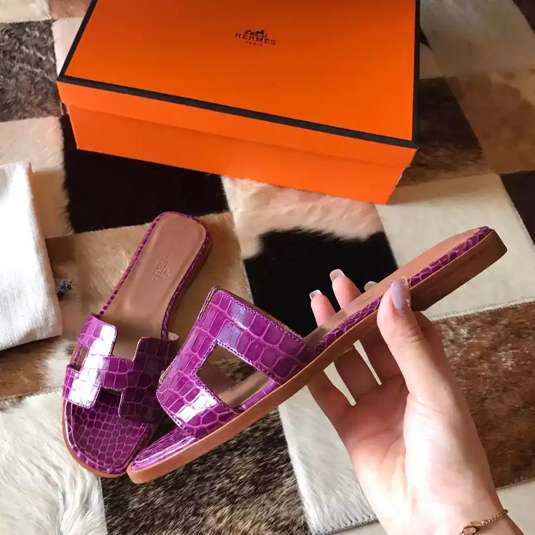 HERMES ORAN SLIDE SANDALS IN PURPLE SHINY NILOTICUS CROCODILE SKIN – HMSD054