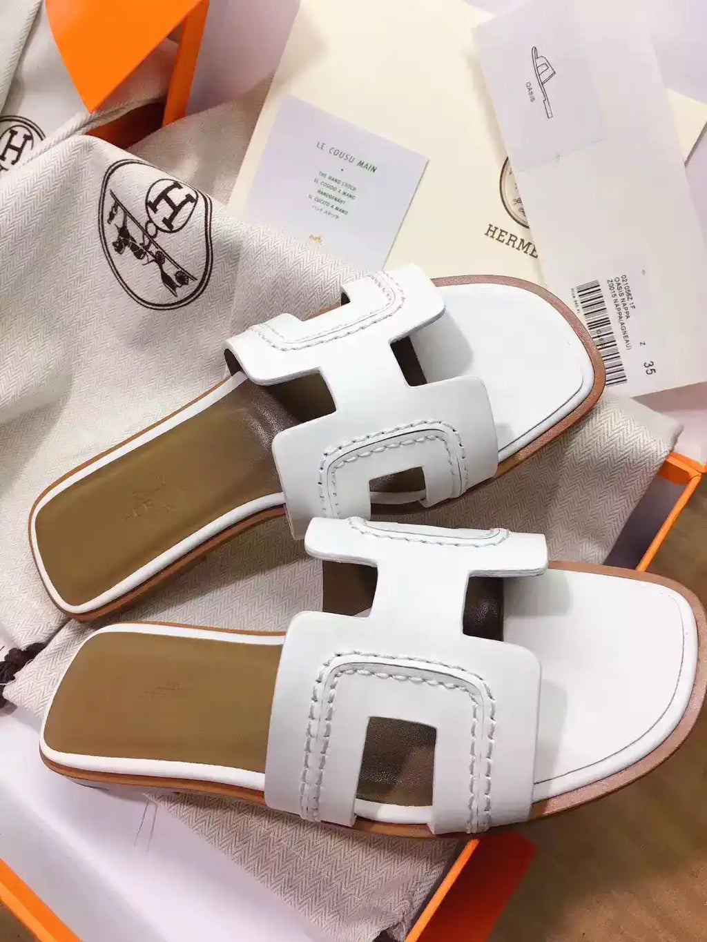 HERMES ORAN SLIDE SANDALS IN WHITE LEATHER WITH STITCHED – HMSD045