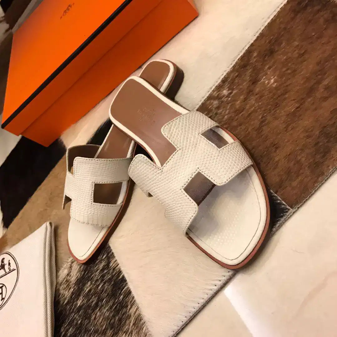 HERMES ORAN SLIDE SANDALS IN WHITE LIZARD LEATHER – HMSD120