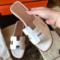 HERMES ORAN SLIDE SANDALS IN WHITE SHINY NILOTICUS CROCODILE SKIN – HMSD056