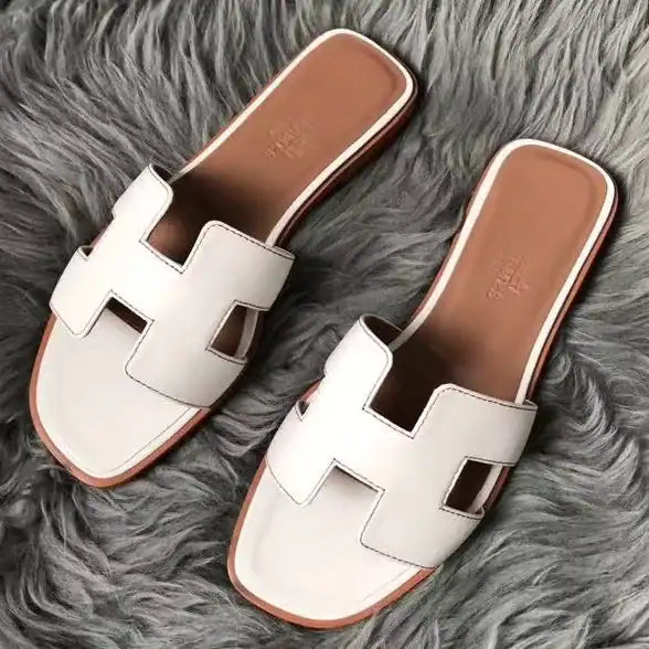 HERMES ORAN SLIDE SANDALS IN WHITE SWIFT CALFSKIN – HMSD130