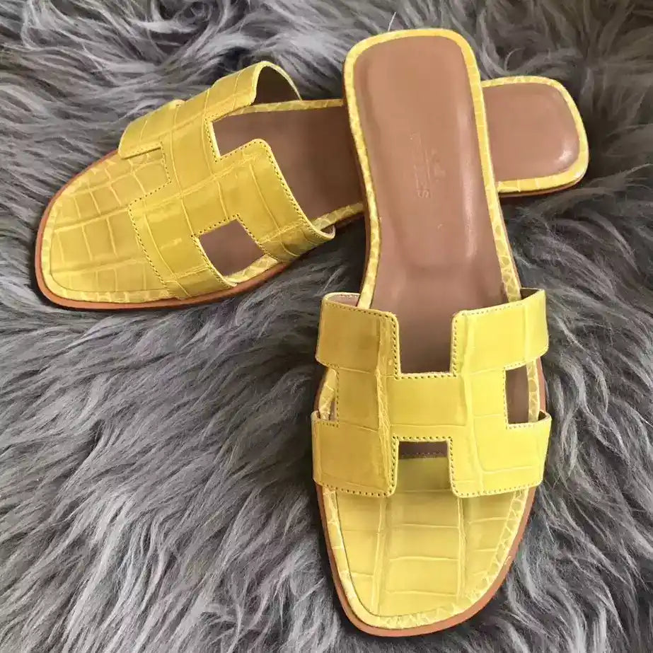 HERMES ORAN SLIDE SANDALS IN YELLOW SHINY NILOTICUS CROCODILE SKIN – HMSD062