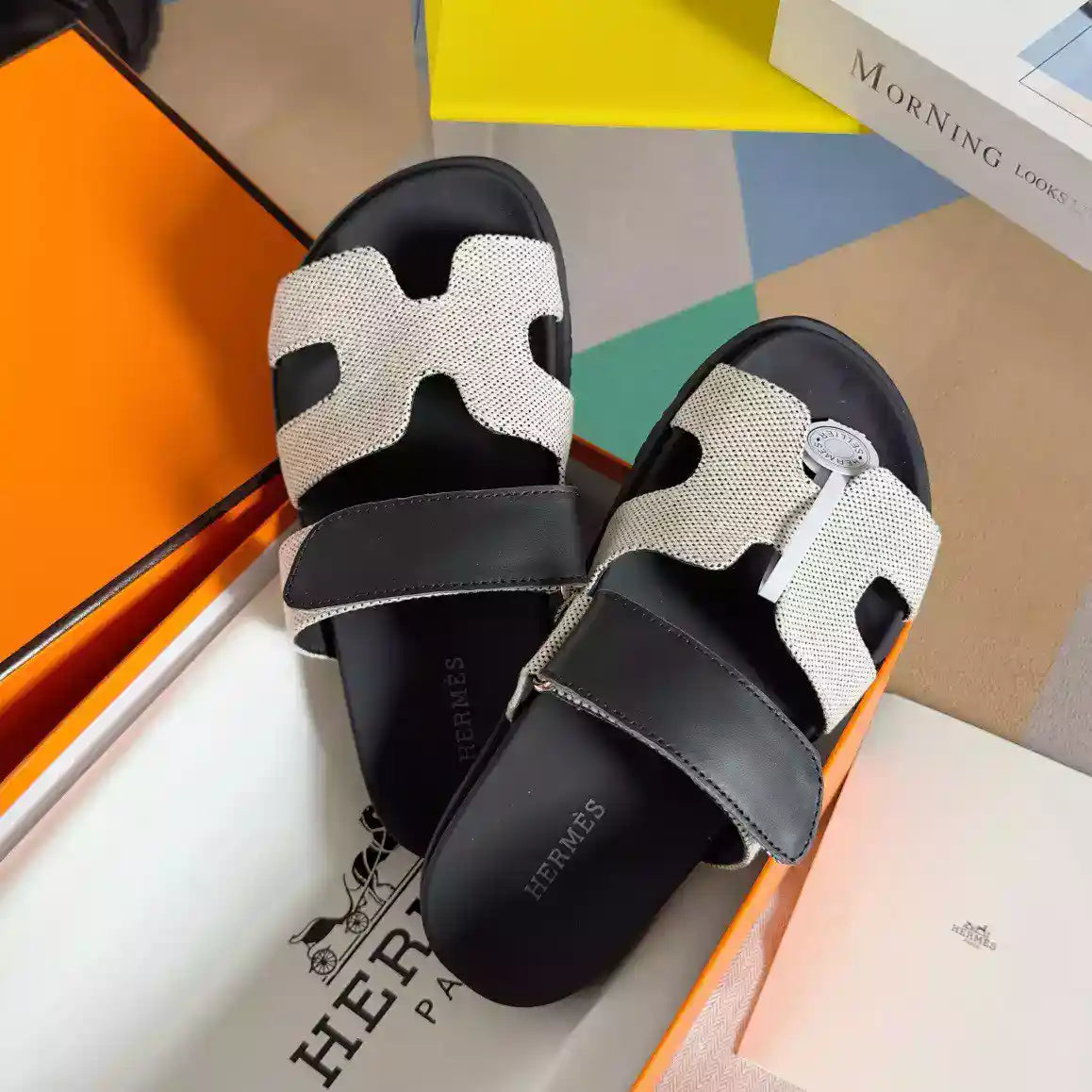 HERMES WOMEN’S CHYPRE SANDALS IN CANVAS WITH BLACK LEATHER – HMSD014