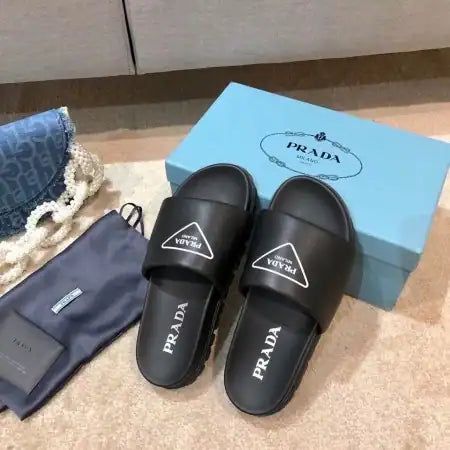 PRADA BLACK LEATHER SLIDES WITH PRINTED TRIANGLE LOGO – PSD088