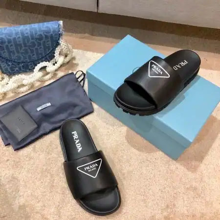 PRADA BLACK LEATHER SLIDES WITH PRINTED TRIANGLE LOGO – PSD088