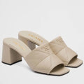PRADA HEELED SLIDE SANDALS 65MM IN BEIGE NAPPA LEATHER – PSD037