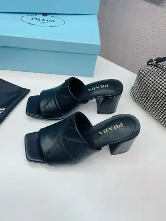 PRADA HEELED SLIDE SANDALS 65MM IN BLACK NAPPA LEATHER – PSD038