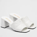 PRADA HEELED SLIDE SANDALS 65MM IN WHITE NAPPA LEATHER – PSD036