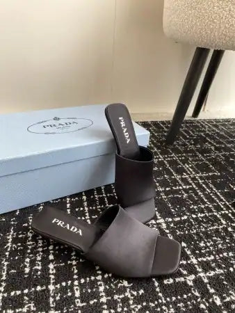 PRADA HEELED SLIDES 35MM IN BLACK SATIN – PSD066