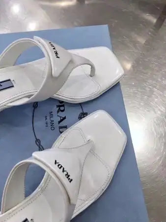 PRADA HEELED THONG SANDALS IN WHITE BRUSHED LEATHER – PSD053