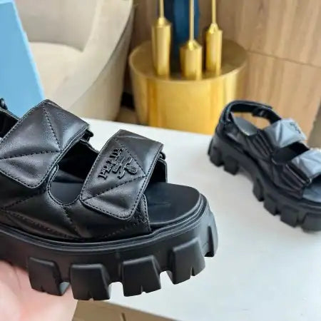 PRADA MONOLITH FLATFORM SANDALS IN BLACK NAPPA LEATHER – PSD019