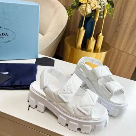 PRADA MONOLITH FLATFORM SANDALS IN WHITE NAPPA LEATHER – PSD020