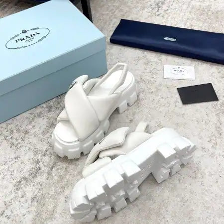 PRADA MONOLITH PADDED SANDALS IN WHITE NAPPA LEATHER – PSD018