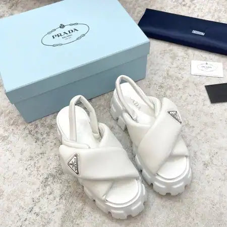PRADA MONOLITH PADDED SANDALS IN WHITE NAPPA LEATHER – PSD018