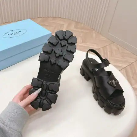 PRADA MONOLITH SANDALS IN BLACK RUBBER – PSD021