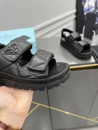 PRADA PADDED SANDALS IN BLACK NAPPA LEATHER – PSD039