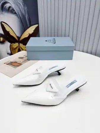 PRADA SABOTS MULES IN WHITE BRUSHED LEATHER – PSD055
