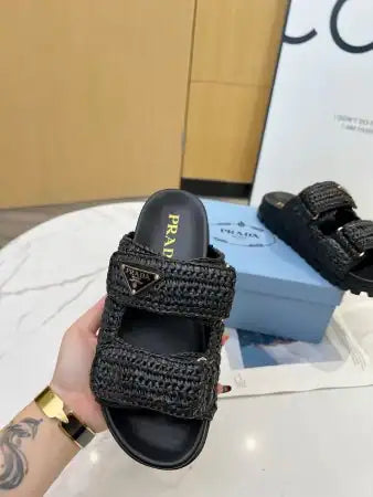 PRADA WOMEN’S CROCHET SANDALS IN BLACK RAFFIA – PSD025