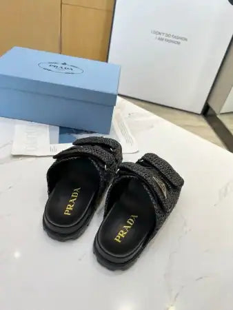 PRADA WOMEN’S CROCHET SANDALS IN BLACK RAFFIA – PSD025