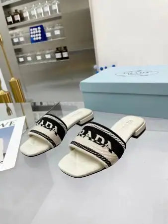 PRADA WOMEN’S EMBROIDERED FABRIC SLIDES – PSD084