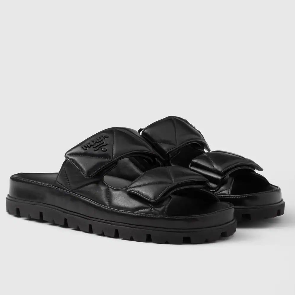 PRADA WOMEN’S SANDALS IN BLACK PADDED NAPPA LEATHER – PSD023