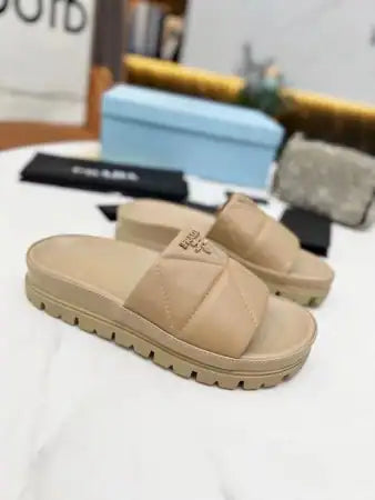 PRADA WOMEN’S SLIDES IN BEIGE QUILTED NAPPA LEATHER – PSD082