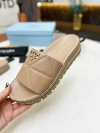 PRADA WOMEN’S SLIDES IN BEIGE QUILTED NAPPA LEATHER – PSD082